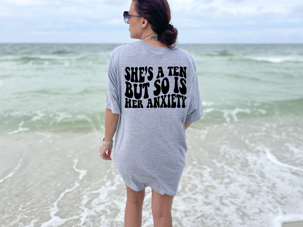 She's a Ten but so is her Anxiety - Bella + Canvas Unisex Adult Tee | Black ink
