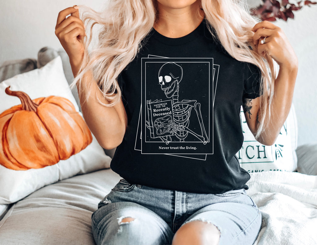 Never Trust the Living - Black Bella + Canvas Unisex Adult Tee | White ink